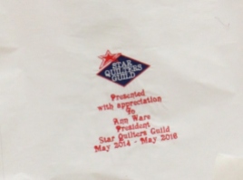 The embroidered quilt label - to be signed by members